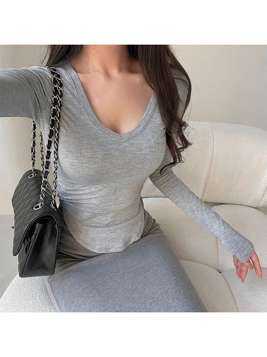 Daisy Solid Color Curved Hem Long-sleeved Slim Top